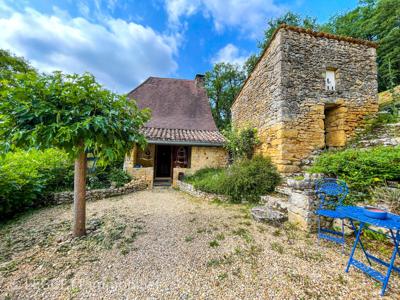 SOUS OFFRE - Ravissante maison de vacances en pierre avec immense grange rénovée, terrain boisé de 1,5 ha