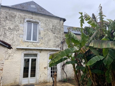 Maison mitoyenne en vente